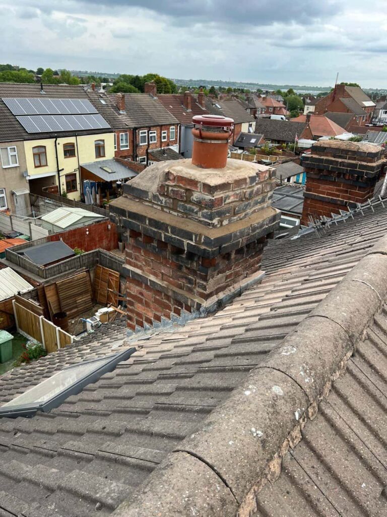 This is a photo taken from a roof which is being repaired by Ollerton Roofing Repairs, it shows a street of houses, and their roofs