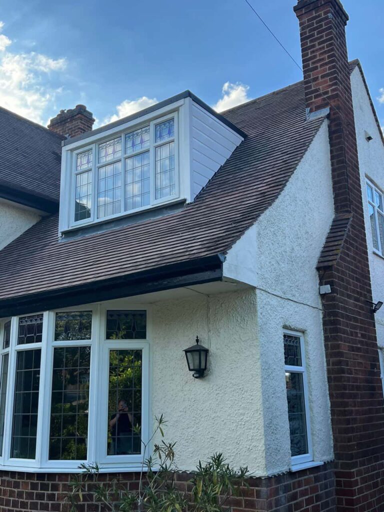 This is a photo of a dormer window which has just had some repairs carried out where the roof and the dormer meet. Works carried out by Ollerton Roofing Repairs